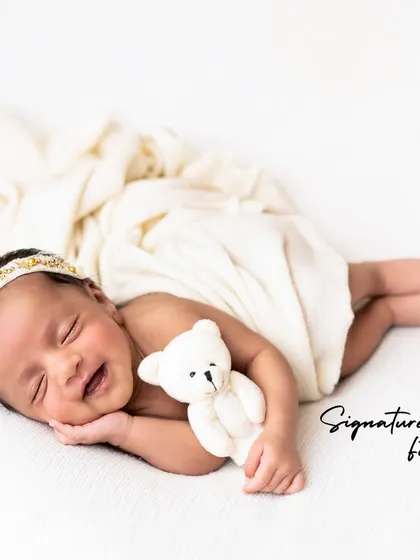 A duplicate of image 162, a heartwarming sleepy smile.
