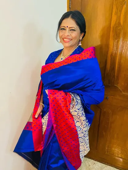 A happy pose in my royal blue Banratri saree. The richness of the color and the weave makes it a personal favorite.