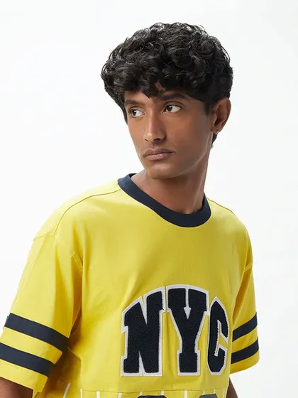 This Westside shoot required a natural look for the model, focusing on clean skin and styled hair to complement the casual, youthful clothing.