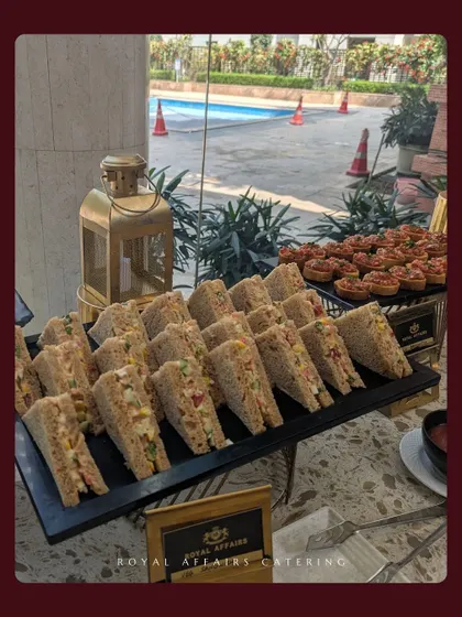 A closer look at the classic finger sandwiches served at a corporate high-tea. I use fresh ingredients to create satisfying and easy-to-eat options for business meetings and seminars.