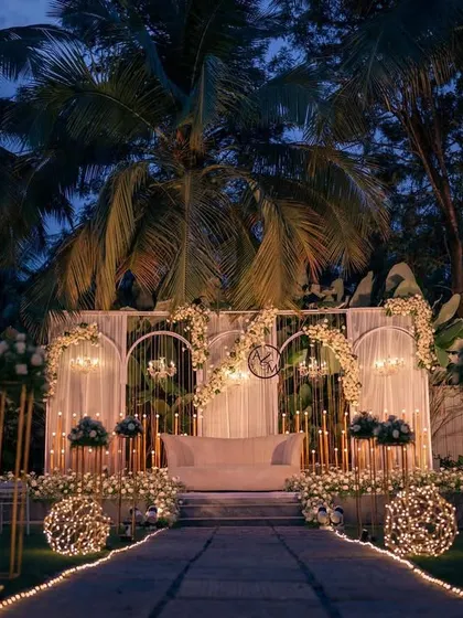 We create dreamy, romantic settings for your most cherished milestones. This outdoor reception was lit by hundreds of fairy lights, creating a magical canopy for an evening of celebration.