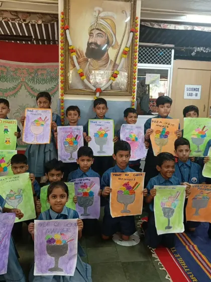 A group of young boys showing off their colorful ice cream drawings. Even simple subjects can spark immense creativity and joy.