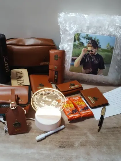 This personalized gift set for actor Zain Imam shows the range of my custom leatherette accessories. The collection includes a name-engraved bottle, wallet, luggage tag, comb, and even a photo pillow, creating a coordinated and thoughtful gift.