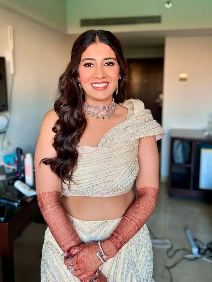 Ready for the sangeet celebration. This look is all about elegance, with glowing skin, soft shimmery eyes, and a beautiful smile.