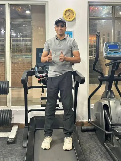 A moment of satisfaction after a good treadmill session. Consistent cardio is the key to building the endurance needed for any sport.