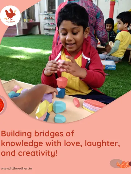 Building bridges of knowledge with love, laughter, and creativity. A child joyfully builds with colorful blocks, a perfect example of how our educators nurture curious minds.