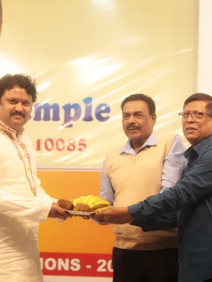 A moment of felicitation at the temple, where I am honored for our academy's contribution to the Mandala Puja celebrations.