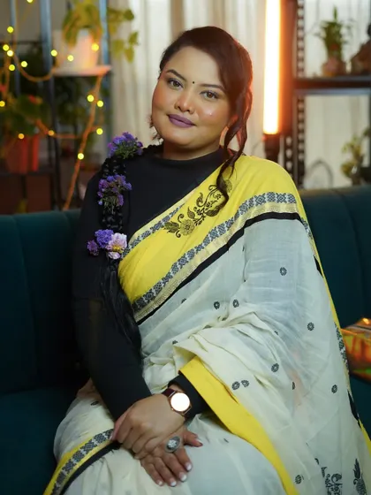A full view of the soft glam look, paired with a beautiful saree and floral hair accessory. This shows how makeup can complete and elevate your entire look for a special event.