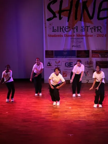 A synchronized move from a large group performance.