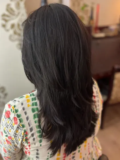 The back view shows the seamless blending of the layers.