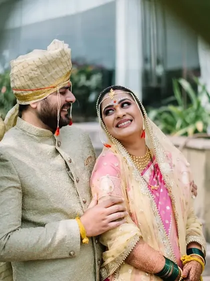 The way Prerna looks up at Abhiroop is so full of love. I used the leaves in the foreground to create a sense of intimacy for this candid wedding portrait.