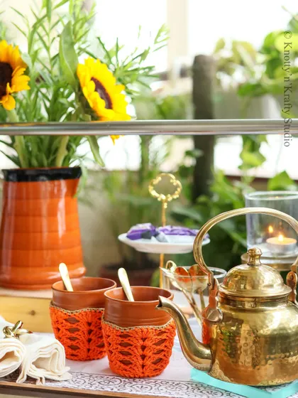 Winters are for kulhad chai. These orange crochet cozies make holding the warm clay cups so much more comfortable and stylish.
