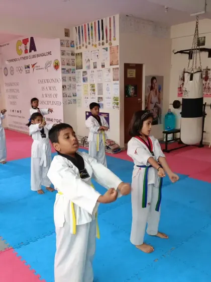 Yellow and green belts practicing their basic forms together.