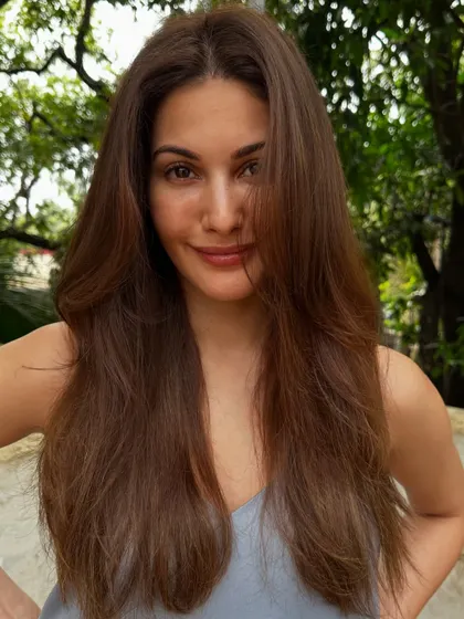 The pretty Amyra Dastur looking stunning after a fresh cut and color. We kept it natural and beautiful with a simple blowout to show off her healthy hair.