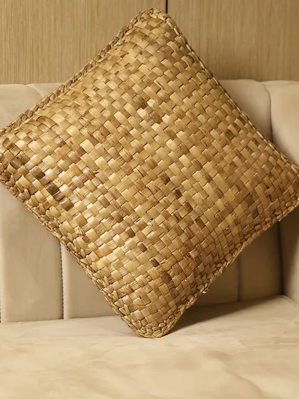 Our woven cushion cover adds a layer of natural texture and rustic charm to any sofa or chair. Made from durable, eco-friendly fibers, it's a unique decorative accent that brings the outdoors in.