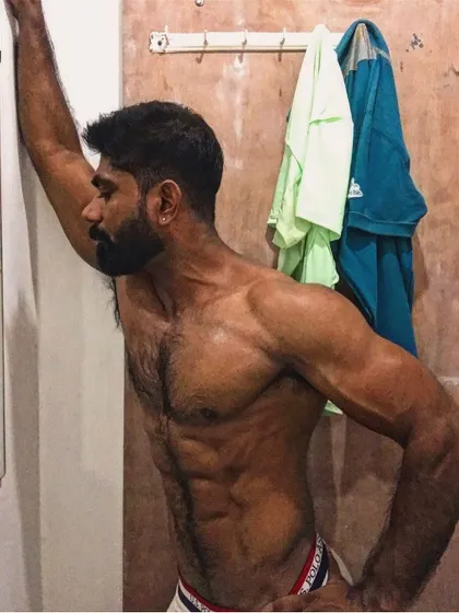 A side shot showing my oblique and chest definition.