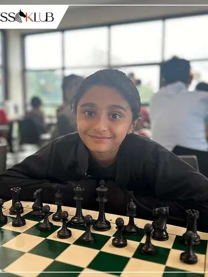 A young player ready for her first game at the new JP Nagar center. We aim to create a welcoming and inspiring space for the next generation of chess lovers.