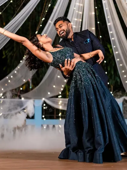 A dramatic dip that showcases the couple's trust and chemistry, making for a breathtaking photo.