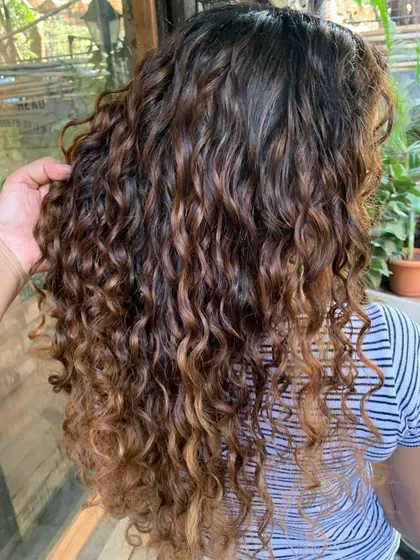 A close-up of the mermaid curls. The non-bleach color adds so much dimension and shine. (No filter)