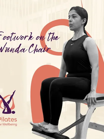 This is the "Footwork on the Wunda Chair," a fundamental Pilates exercise. It is designed to improve foot and ankle mobility while strengthening your leg muscles and engaging your core for a power-packed workout.