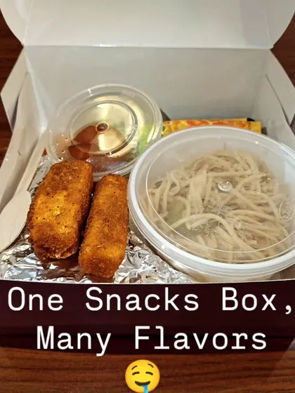 Paneer nuggets, noodles and gulab jamun make up this snack box we pack with separate containers for the noodles and sweet.