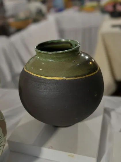 A few of my favorite finished vases from a recent collection, featuring a variety of glazes, painted details, and forms. Each one has its own personality.
