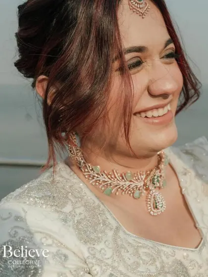 A close-up of her glowing skin and the subtle makeup that enhances her natural beauty.