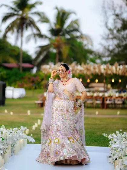 A fun and quirky shot of Tithi on the aisle. Her personality shines through, and her makeup is fresh and radiant.