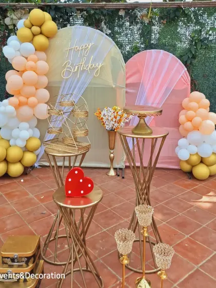 The full view of the elegant outdoor birthday setup, perfect for a daytime celebration or garden party.