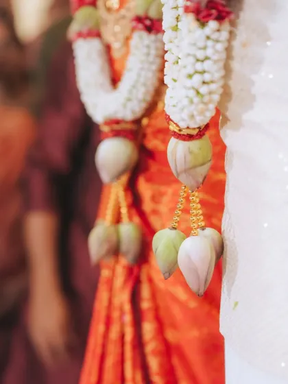 A detail shot of the beautiful jasmine and lotus bud garlands, an essential element of South Indian wedding traditions.