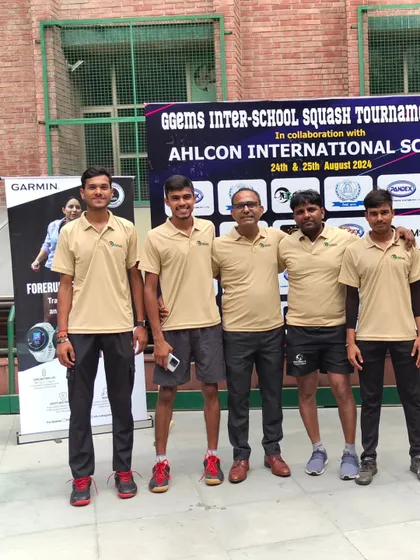 Our team of coaches and organizers, ready for a big day of matches at the GGems Inter-School Squash Tournament.