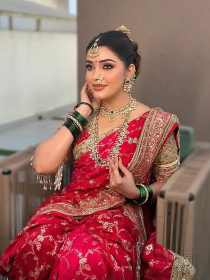A bride in a traditional red saree, showing that my rental collection also includes classic options beyond lehengas.