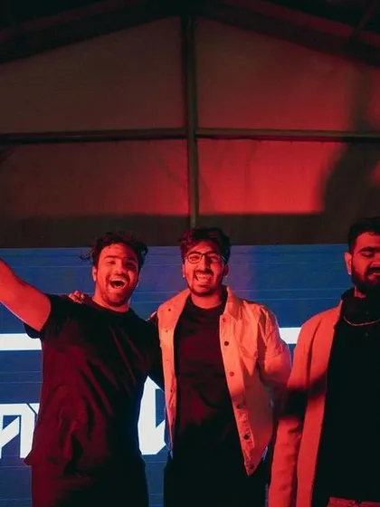 A celebratory moment on stage with my team. Every successful show is a group effort.