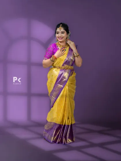 Another view of the purple embroidered blouse, showing its regal and festive appeal.
