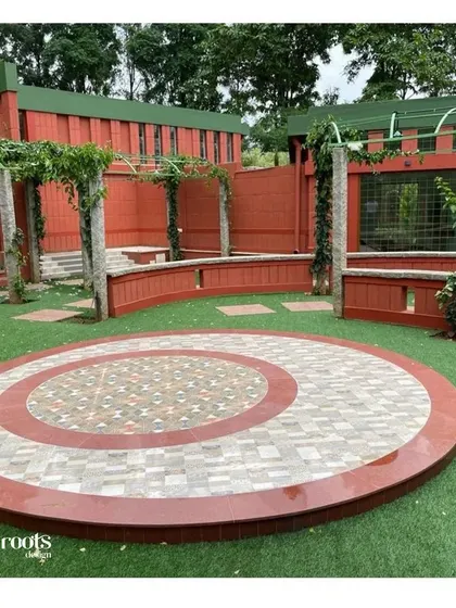 A duplicate of image 22, showing the circular stone patio.