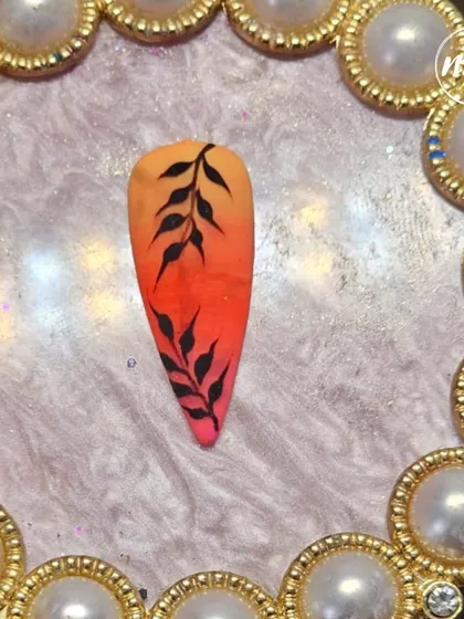 Another angle of the student's sunset ombre nail art. The color blending is smooth and the silhouette is crisp.