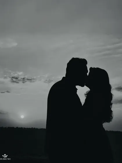 A classic silhouette of a couple kissing against the sunset. This timeless shot is the epitome of romance and a beautiful way to end a pre-wedding shoot.