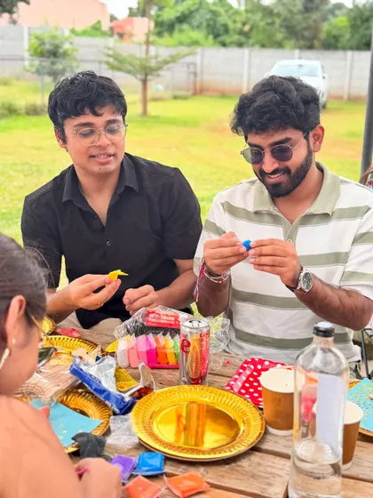 Laughter and fun around the table. Our parties are a great way to bring friends together for a unique and memorable celebration centered around your dog.