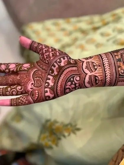A side view of a hand with a beautiful band of repeating elephant motifs. This is a popular element in traditional Rajasthani and Jaipuri designs.