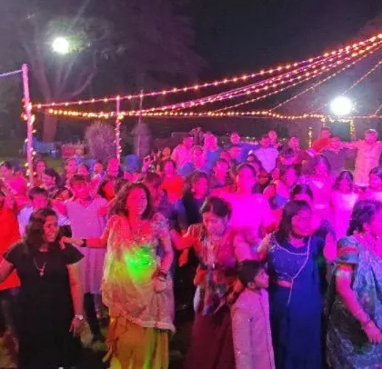 The ladies lead the dance at the Diwali celebration.