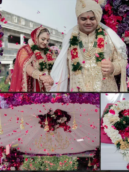 The couple holding hands after the Varmala ceremony, surrounded by a cascade of flowers. The mandap was adorned with enchanting hues of pink and purple.