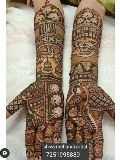 A design rich in symbolism, featuring a cow and bell, a peacock, and lotus flowers, all classic elements of Indian art.