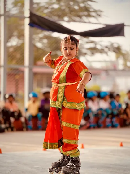 Another expressive moment from the unique classical dance and skating fusion performance.