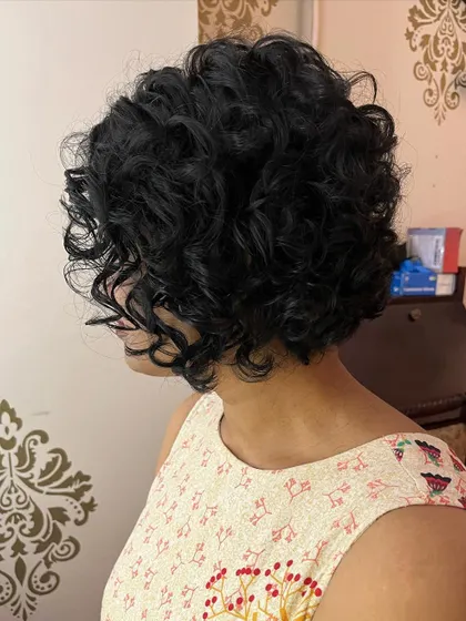 A side view of the short curly bob, showing its great shape and texture.