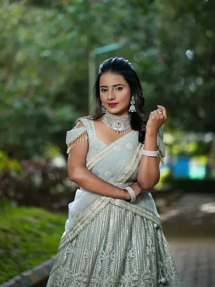 A client looking absolutely stunning in a grey embroidered lehenga for Navaratri Day 3.