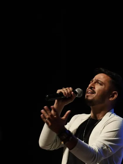 Lost in the music under the spotlight. This is where I feel the most alive and connected to my soul.