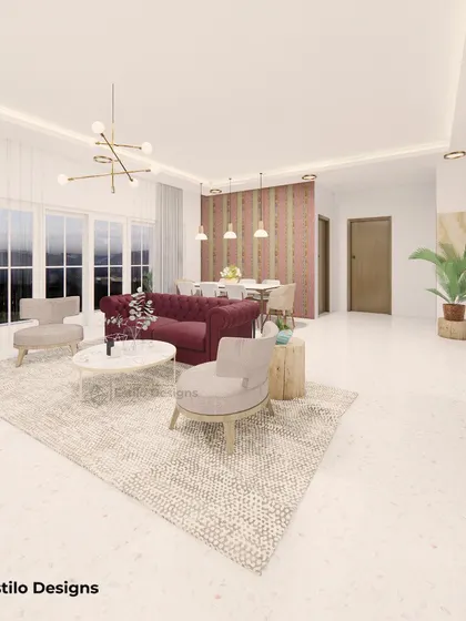 This living room is designed for a bright and airy feel, with a pop of color from the maroon sofa. I used a large area rug to define the seating space and modern, minimalist furniture to create an atmosphere of understated luxury.