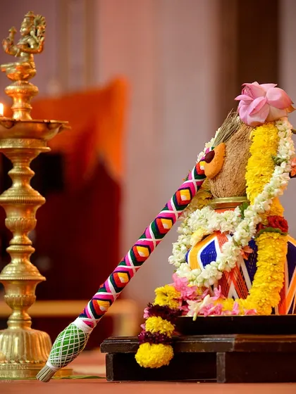 A beautifully decorated kalash and lamp, central to the Navratri puja. These symbols represent creation, abundance, and the divine light.