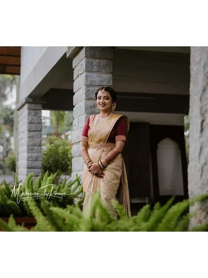 A full-length shot of Ashwini in her elegant wedding attire.