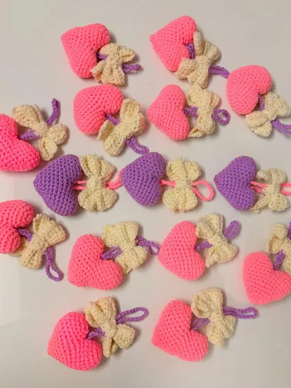 These heart and bow bag hangings are perfect as party favors or small gifts. I can create them in various colors for bulk orders.